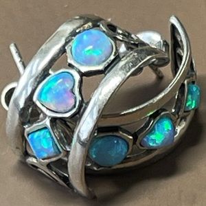 Triple opal sterling silver half hoop pierced post earrings.